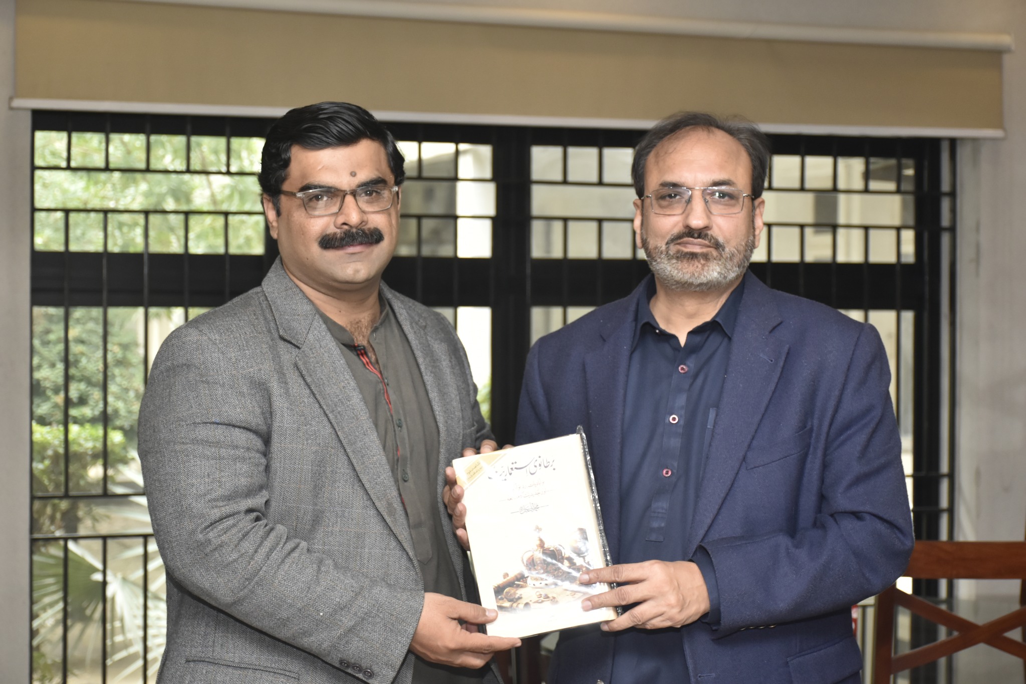 Public Relations Communication Officer University of Home Economics Lahore Dr. Muhammad Akmal Soomro visited UET Lahore and presented his newly launched book to Vice Chancellor Prof. Dr. Shahid Munir (TI).